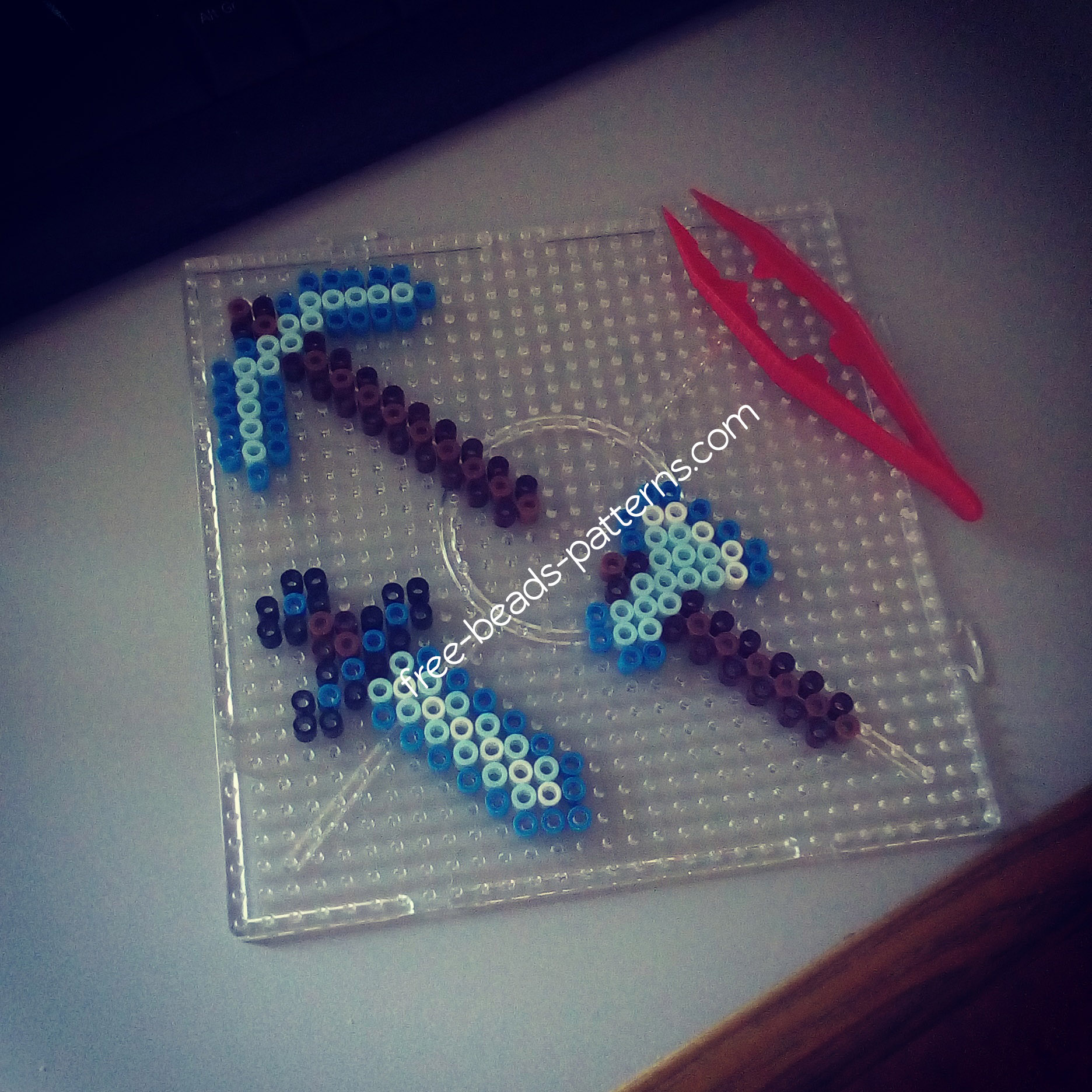 Minecraft axe pickaxe and sword perler beads work photo