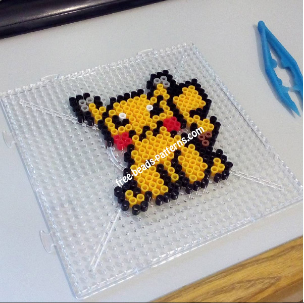 Pikachu sitting perler beads hama beads work photo