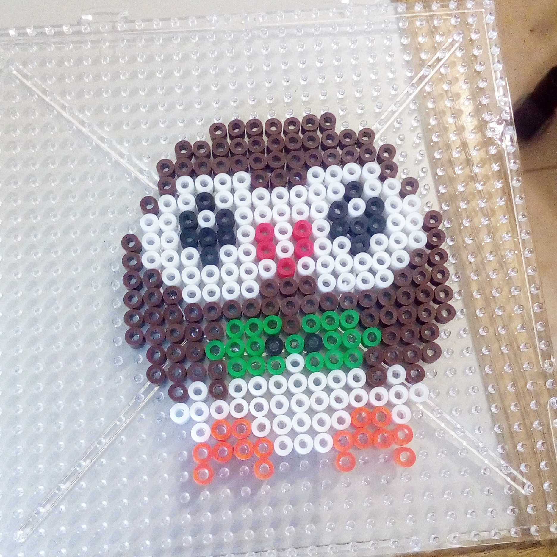 Pokemon Sun Moon Rowlet hama perler work by Bill