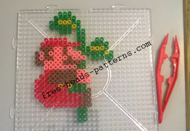 Super Mario Bros climbing the plant 2D perler beads on pedestal photos (1)
