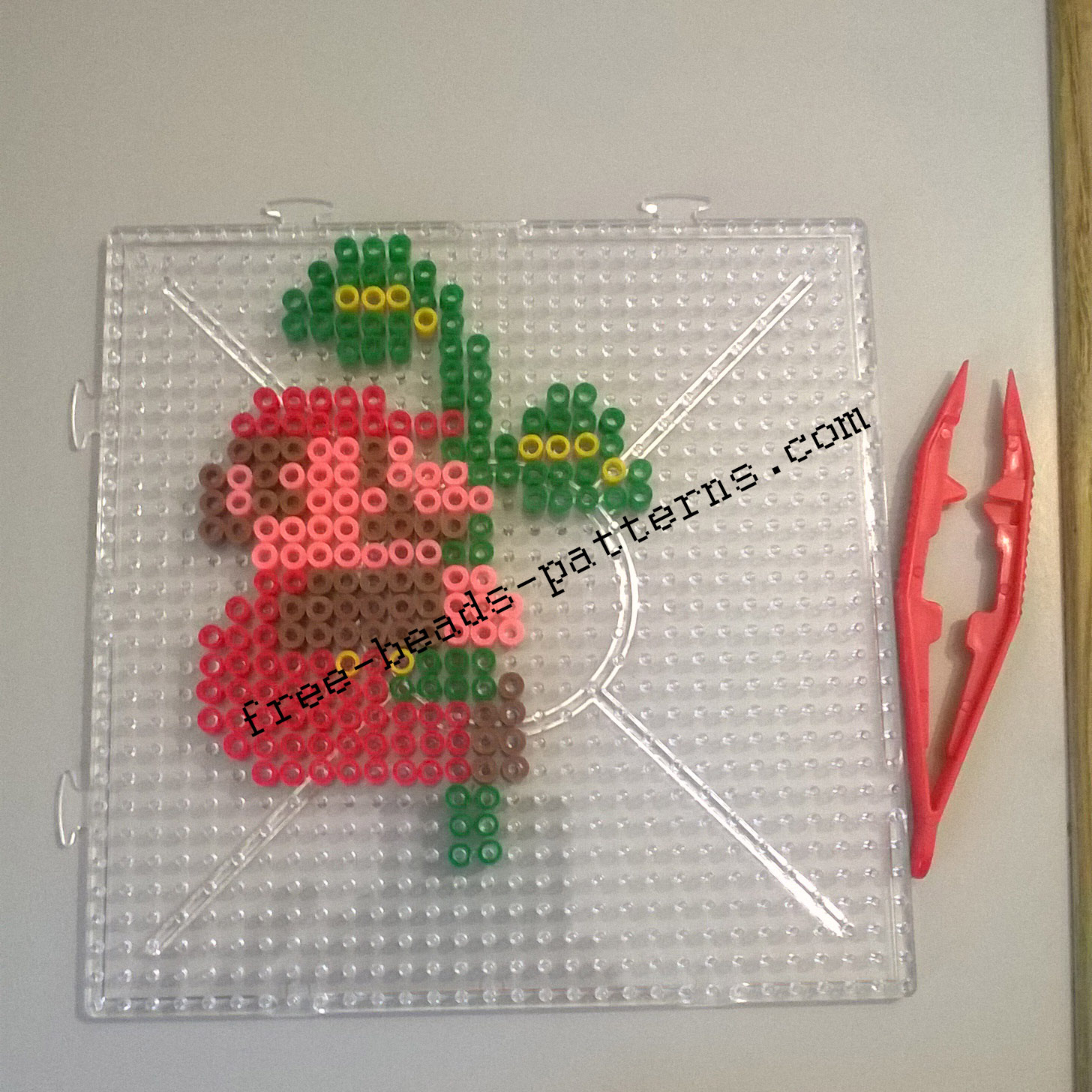 Super Mario Bros climbing the plant 2D perler beads on pedestal photos (1)