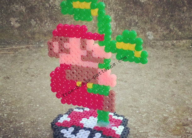 Super Mario Bros climbing the plant 2D perler beads on pedestal photos (2)