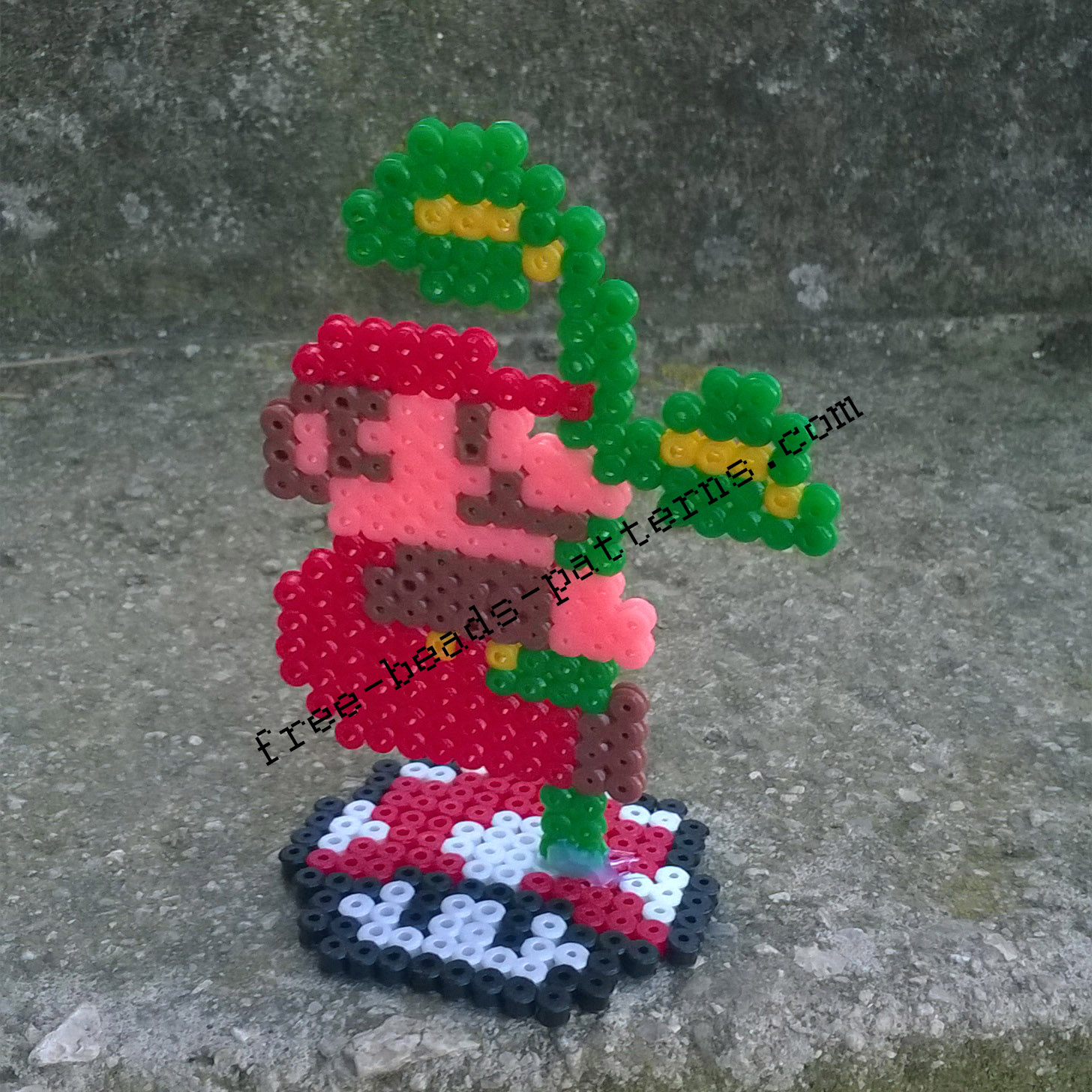 Super Mario Bros climbing the plant 2D perler beads on pedestal photos (4)